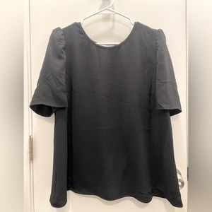 Neverworn, black tulip back blouse. Sz: L